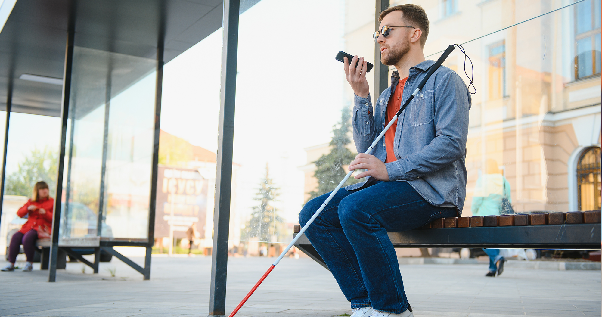 visually impaired person talking on the phone